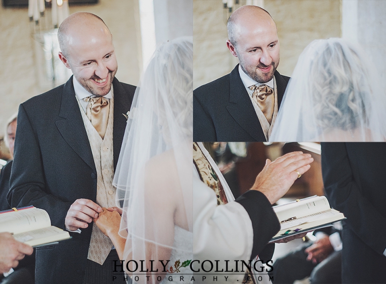 Groom lovingly looking at his bride during ceremony in St Petrox Church, Dartmouth by Devon Wedding Photographer Holly Collings
