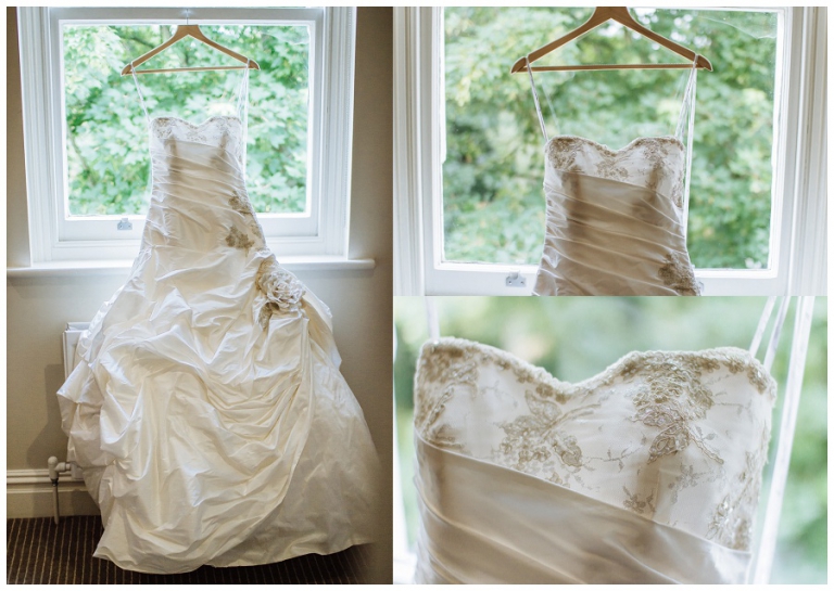 Wedding dress hanging in window at hotel in bournemouth