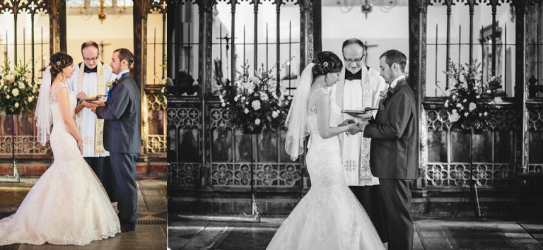 bride and groom exchaning wedding rings at the alter in st saviours church dartmouth