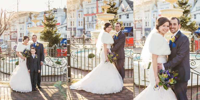 portraits in dartmouth avenue gardens of married couple by fountain with golden water bokeh in background