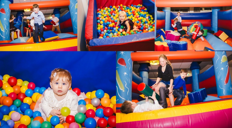 children having fun at dartmouth golf and country club reception with bouncy castle and ball pit