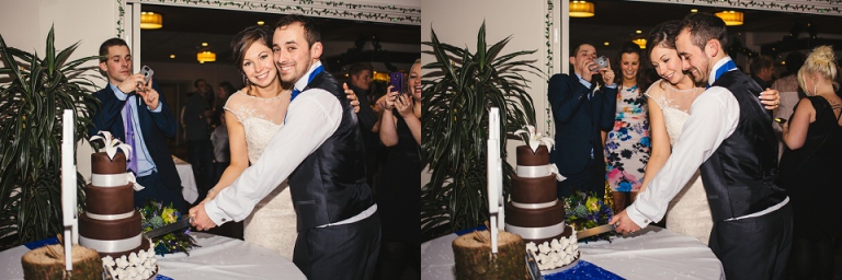 bride and groom cutting cake at dartmouth golf and country club reception