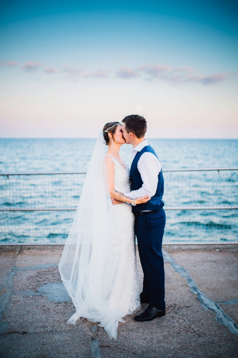 Intimate, Pastel Vintage Wedding Photography at Redcliffe Hotel, Paignton, Devon_sunset and moon couple portrait, bride and groom kiss