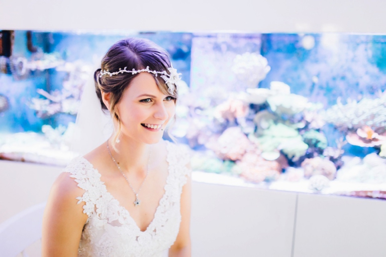 Bridal Box and Bridal Rooms Wedding Photography at Redcliffe Hotel, Paignton, Devon_modern bridal portrait, bride in front husbands fish tank