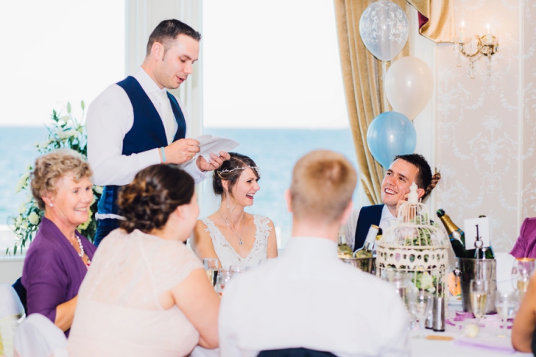 Intimate, Pastel Vintage Wedding Photography at Redcliffe Hotel, Paignton, Devon_bride and groom laughing during brothers speech