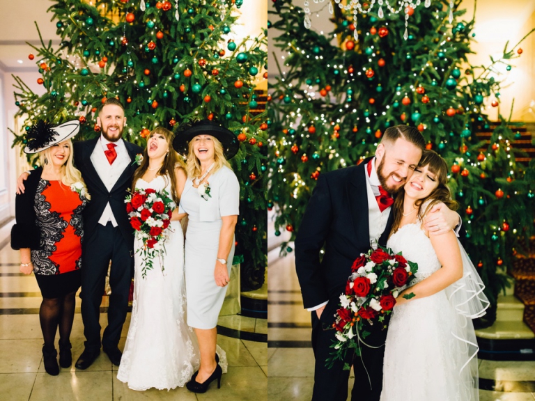 Best of wedding photography 2015 - Natural, Candid, Photojournalistic Style_fun group portrait by christmas tree at Imperial Hotel - imperial hotel christmas portraits in front of tree
