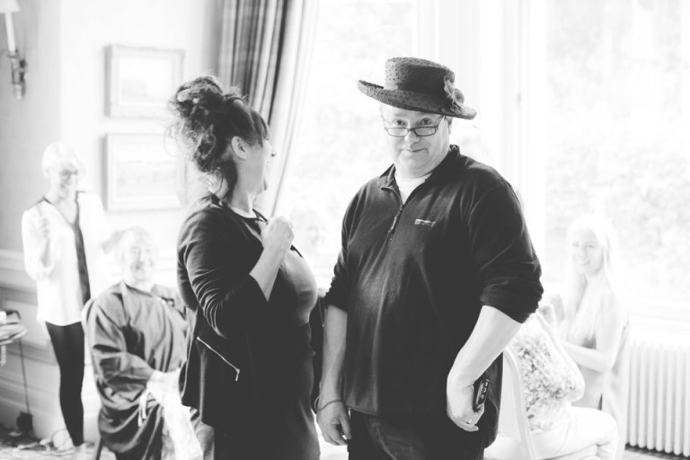 Best of wedding photography in Torquay, Paignton, London and Exeter - Natural, Candid, Photojournalistic father of the bride wearing ladies hat