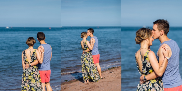 Best of wedding photography in Torquay, Paignton, London and Exeter - Natural, Candid, Photojournalistic shaldon engagement session by the sea man kissing girlfriends forehead