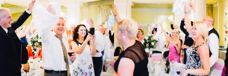 Best of wedding photography in Torquay, Paignton, London and Exeter - Natural, Candid, Photojournalistic entertainment during wedding breakfast, guests waving napkins