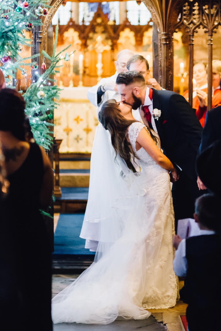 Best of wedding photography 2015 - Natural, Candid, Photojournalistic Style_First kiss as husband and wife at Cockington Church