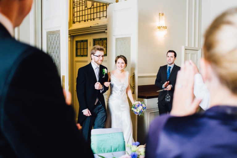 Best of wedding photography in Torquay, Paignton, London and Exeter - Natural, Candid, Photojournalistic - couple entering wedding breakfast at abode exeter