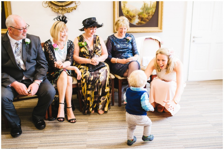 12 Small Intimate Cockington Court Wedding Photography in Torquay - toddler running to mummy