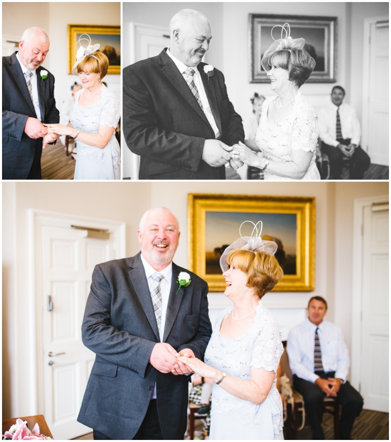 22 Small Intimate Cockington Court Wedding Photography in Torquay - bride and groom exchanging rings during ceremony