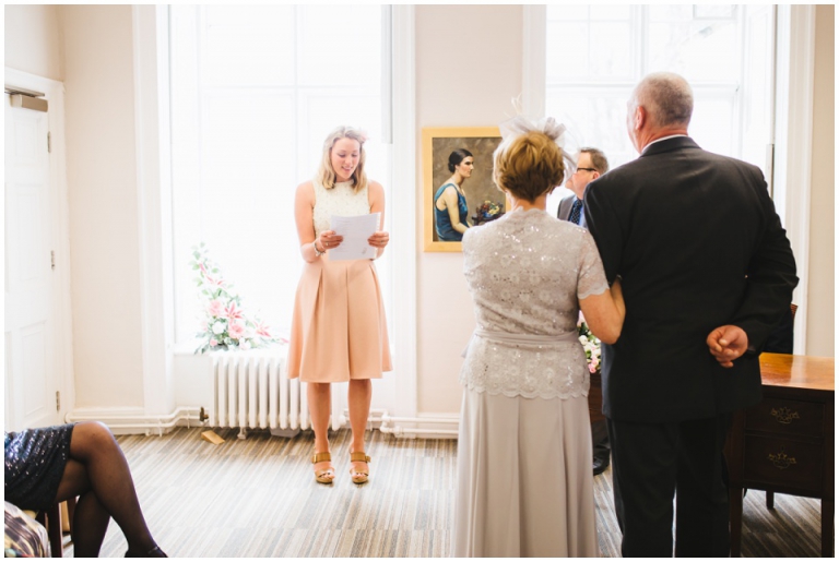 23 Small Intimate Cockington Court Wedding Photography in Torquay - daughter doing reading in ceremony