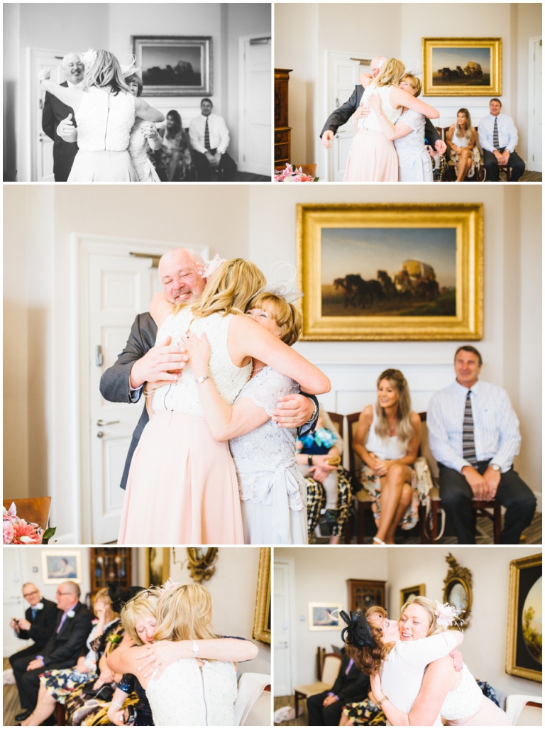 26 Small Intimate Cockington Court Wedding Photography in Torquay - daughter hugging parents as they finally become husband and wife