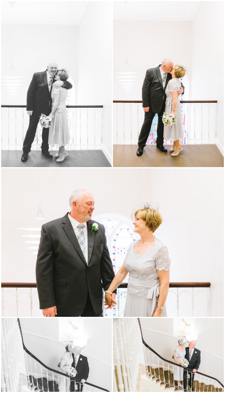 33 Small Intimate Cockington Court Wedding Photography in Torquay - couple holding hands and kissing on stairs