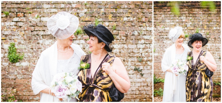 39 Small Intimate Cockington Court Wedding Photography in Torquay - bride and sister in law laughing