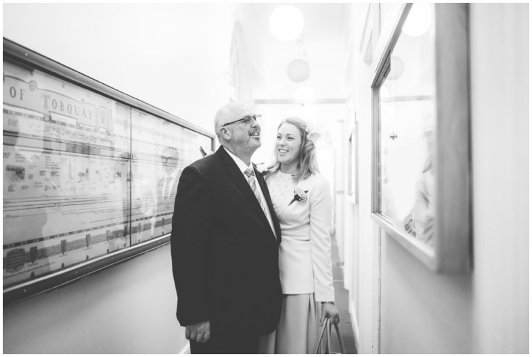 5 Small Intimate Cockington Court Wedding Photography in Torquay - father and daughter laughing before ceremony