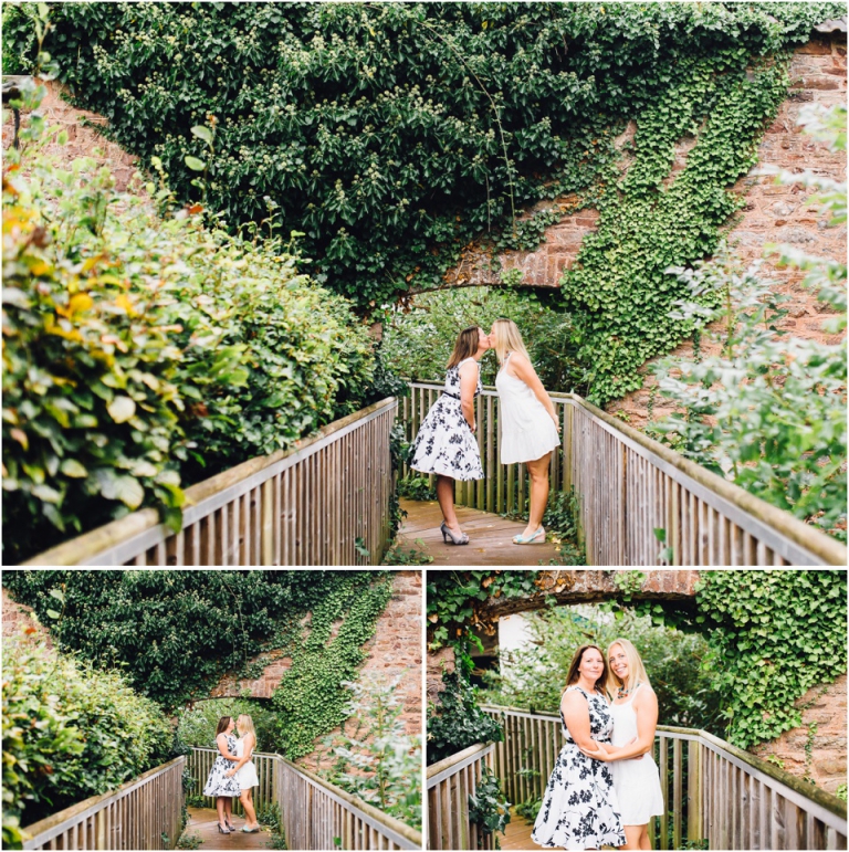 cockington-court-torquay-wedding-photography-documentary-style-17-brides-hugging-and-kissing-under-arch