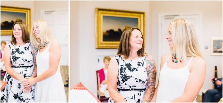 cockington-court-torquay-wedding-photography-documentary-style-8-happy-laughing-brides-in-ceremony