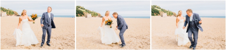 38 Blackpool Sands Dartmouth Wedding Photography Creative Documentary - bride dancing with dad on beach
