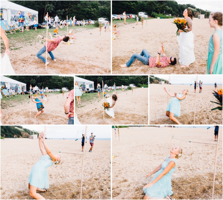 54 Blackpool Sands Dartmouth Wedding Photography Creative Documentary - guests doing limbo on beach