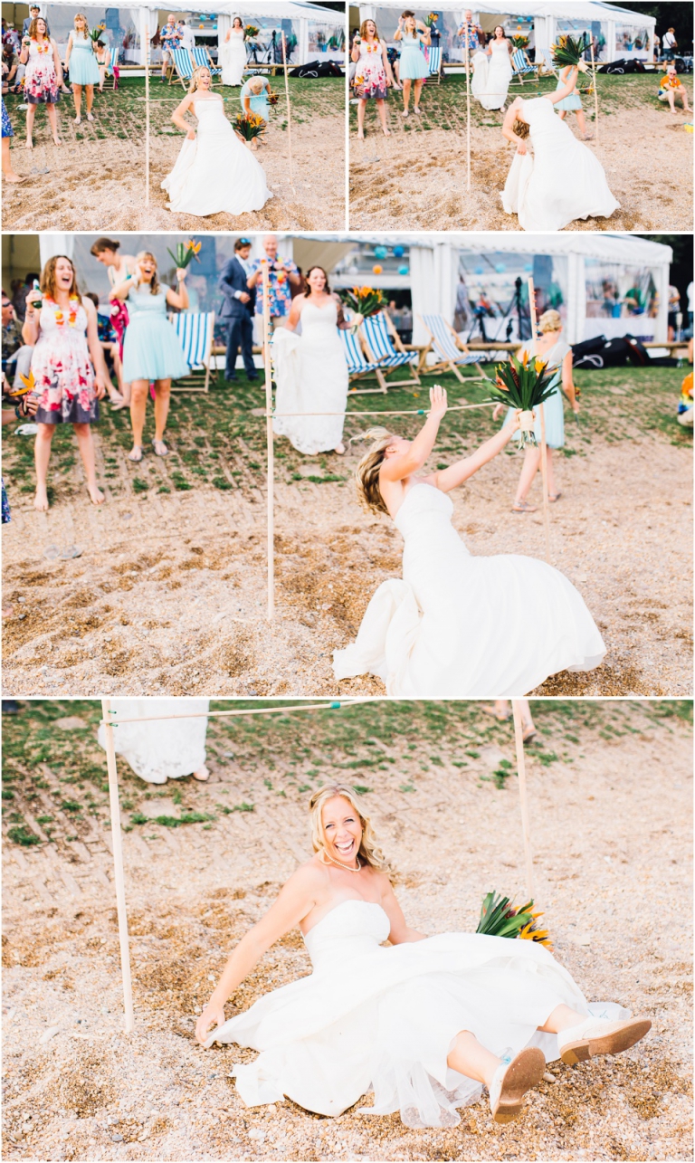 55 Blackpool Sands Dartmouth Wedding Photography Creative Documentary - bride doing limbo dance on beach falling