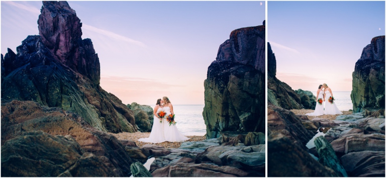 82 Blackpool Sands Dartmouth Wedding Photography Creative Documentary - brides kissing on rocks by sea