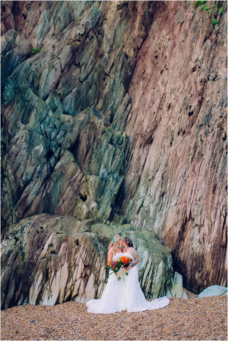 85 Blackpool Sands Dartmouth Wedding Photography Creative Documentary - dramatic cliff couple kissing portrait