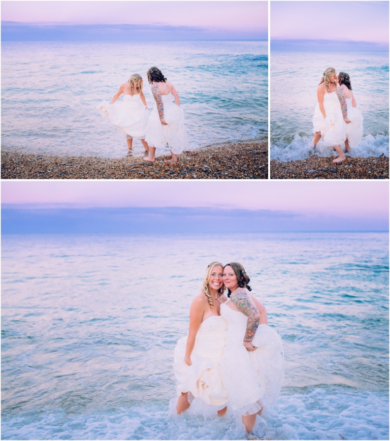 96 Blackpool Sands Dartmouth Wedding Photography Creative Documentary - brides paddling in the sea laughing