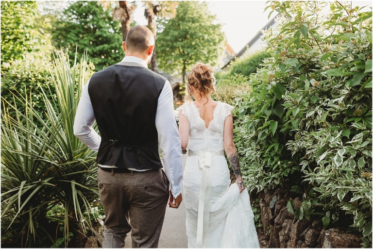 24 Wedding Reception Photography at The Flavel, Dartmouth - couple walking