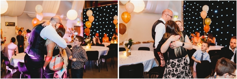 26 Wedding Reception Photography at The Flavel, Dartmouth - guests hugging