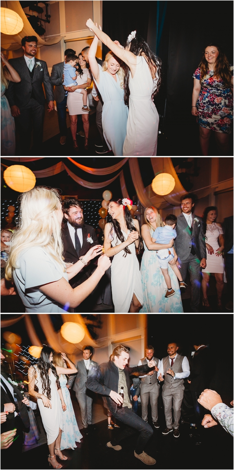53 Wedding Reception Photography at The Flavel, Dartmouth - friends and family laughing and danceing documentary style