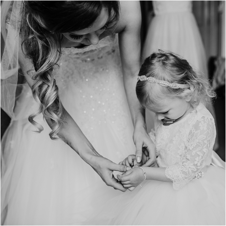 Relaxed, Fun, Natural Toorak Hotel Torquay Wedding Photography 2 - bride putting bracelet on daughter