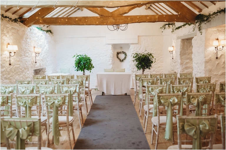 Devon Wedding Photography at Bickley Mill Inn Elegant and Verdant Wedding (1) ceremony room set up by wild floral designs