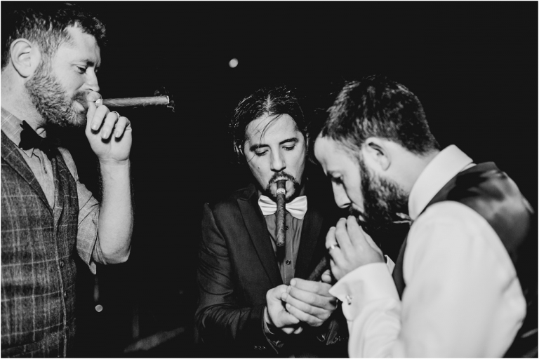 Devon Wedding Photographer Worden House Dartmouth 1920s themed wedding (110) cigar smoking