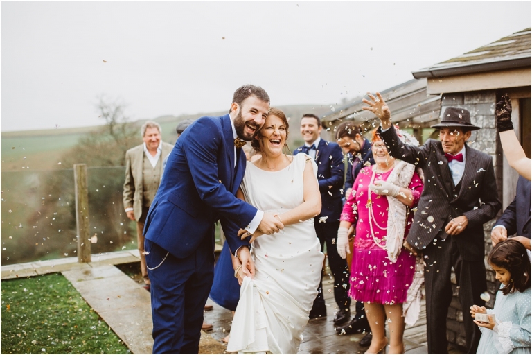 Devon Wedding Photographer Worden House Dartmouth 1920s themed wedding (50) confetti throw