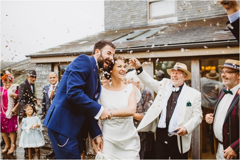 Devon Wedding Photographer Worden House Dartmouth 1920s themed wedding (52) confetti throw