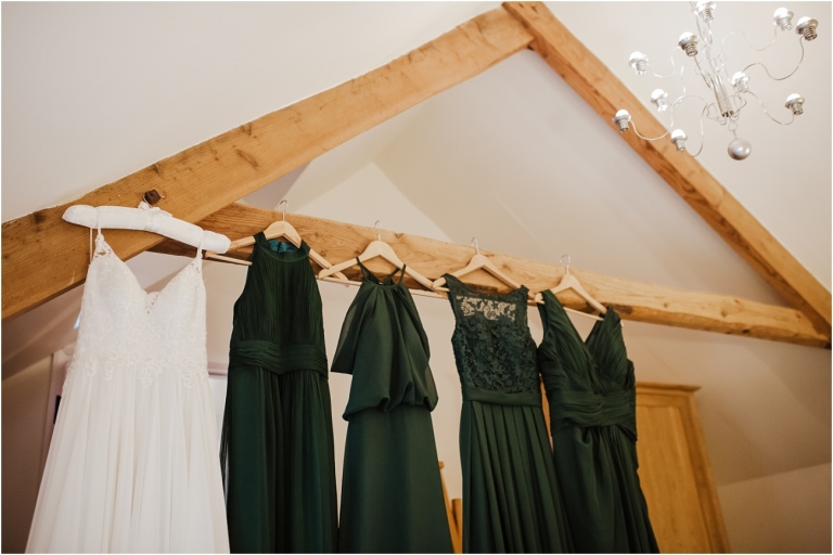 North Devon Wedding Photography at The Milky Way Relaxed Fun DIY Style (1) dresses hanging up